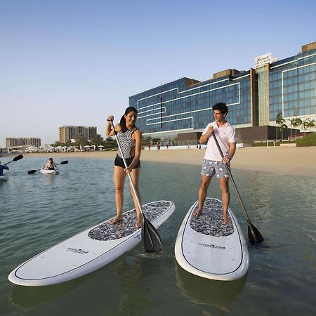 Fairmont Bab Al Bahr Hotel Abu Dhabi Exterior photo Stand Up Paddle Boarding at Jumeirah Beach Hotel